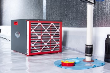 Sump pump and dehumidifier system in a crawl space