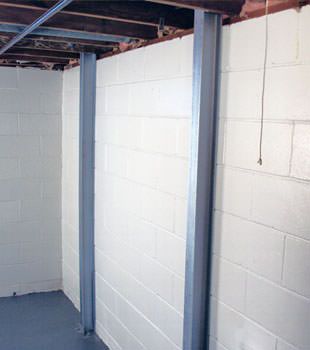 A PowerBrace™ i-beam foundation wall repair system in Montréal