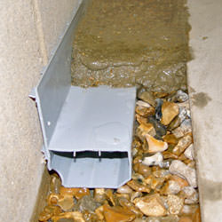 Le système de vidange sous-sol WaterGuard<sup>MD</sup>.