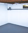 Laval, QC wet basement wall covering that tucks into a perimeter drainage system