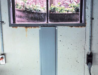 Fenêtre de sous-sol à Trois –Rivières réparée et imperméabilisée